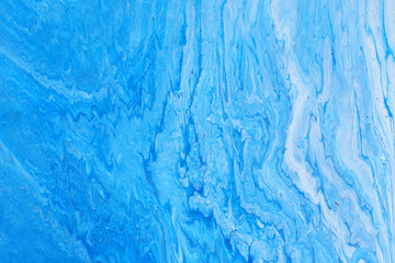 photography of abstract marbleized effect background. Blue and white creative colors. Beautiful paint.