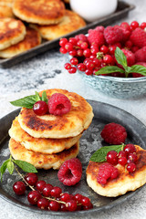 Cottage cheese pancakes Russian syrniki with  berries