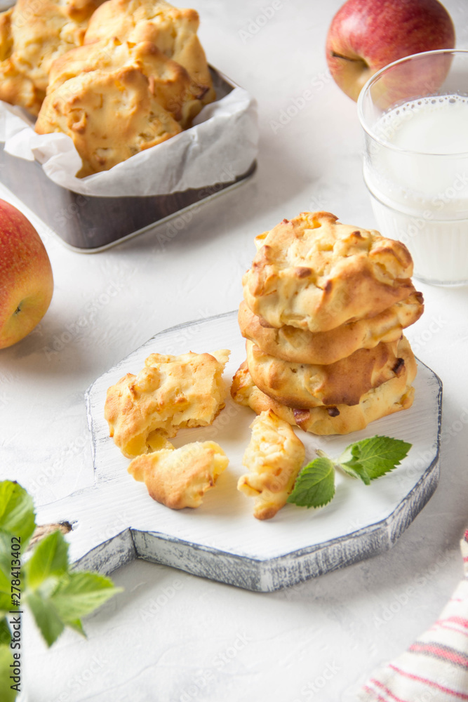 Wall mural Homemade apple cookies with milk and mint, soft and tender biscuits. Summer dessert, autumn food, breakfast for children, sweet lunch