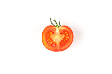 Tomato half slice isolated on white background, top view