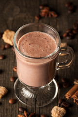 Chocolate, coffee, milk, banana shake on wooden background. Smoothie with cookies. Milkshake. Protein diet. Healthy food concept.