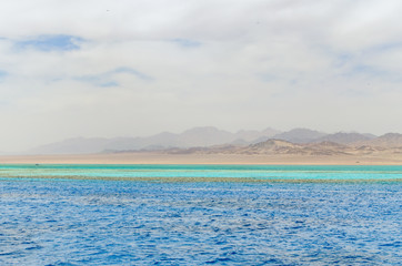 Mountain landscape with blue water in the national park Ras Mohammed, Egypt.