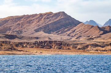 Fototapeta na wymiar Mountain landscape with blue water in the national park Ras Mohammed, Egypt.