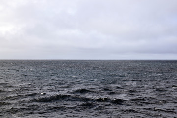 Cloudy sky and grey sea