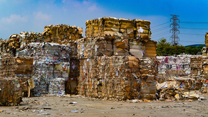 The recycle industry cardboard garbage and paper waste after pressing in hydraulic baling garbage...