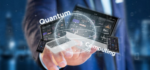 Businessman holding Quantum computing concept with qubit and devices 3d rendering