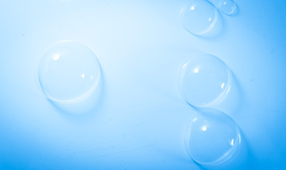 Beautiful abstract close up color white and blue soap bubbles background and wallpaper