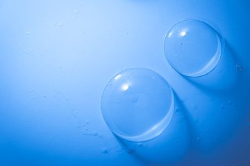 Beautiful abstract close up color white and blue soap bubbles background and wallpaper