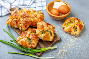 Puffs with spinach, egg and green onions.