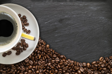 Coffee cup with coffee beans.