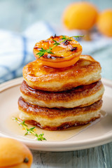 Pancakes with apricot jam and thyme for breakfast.