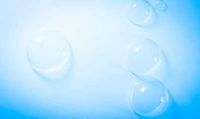 Beautiful abstract close up color white and blue soap bubbles background and wallpaper
