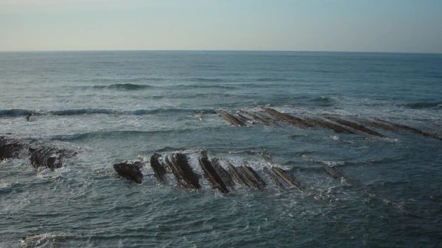 Waves glide over flysch