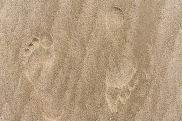 Barfuß Fußabdruck im Sand