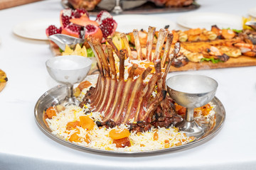 Pork Ribs With Rice, Carrot, Paprika Pepper And Parsley