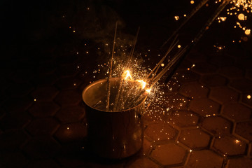 extinguished sparklers in the bucket © spritnyuk
