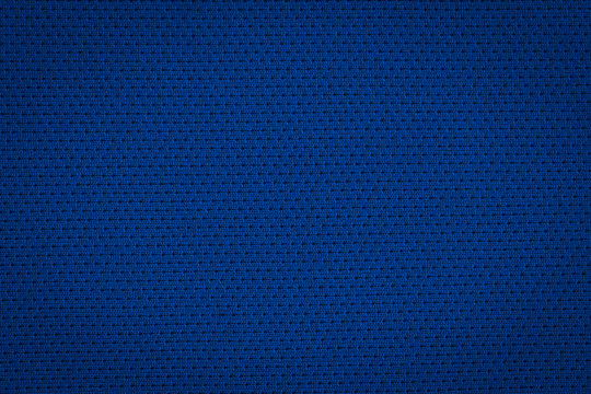 Texture of a real dark blue knit. Fabric background.