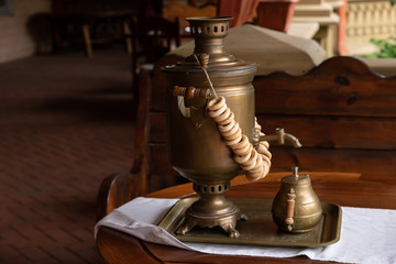Russian traditional tea-drinking: a samovar, drying and tea in cup holder