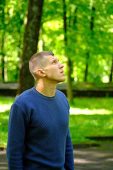 Portrait of young man in casual fashion clothes. Outdoor street photo