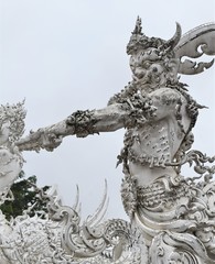 statue at the white temple in thailand