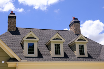 Dormers and Stone Chimneys on New Construction
