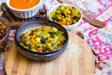 Indian sabji - traditional homemade vegetable's stew with spices. Tomato, potato, aubergine, carrot.