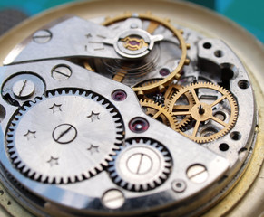 close up macro pic of vintage watch mechanism