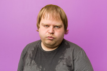 Caucasian crazy blond fat man sweating