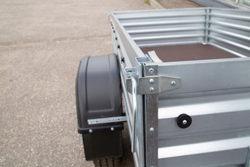 Fototapeta premium Open road trailer. Shop selling car trailers.