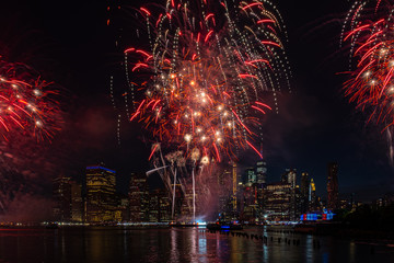 Macy's 4th of July Independence Day Fireworks show on east river with Lower Manhattan Skyline