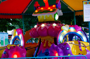 July 2019, Kramatorsk, Ukraine, Jubilee Amusement Park, old people dancing, children