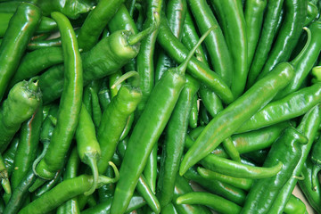 green chili peppers as background