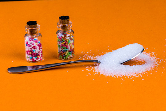 Spoon With Fine White Sugar And Glasses With Sweet