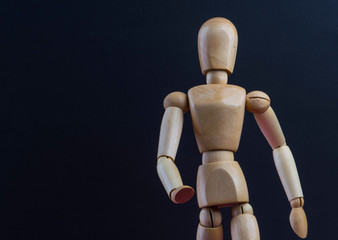 wooden mannequin in action and movement