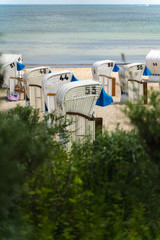  Beach chair on sand beach of baltic sean, Germany