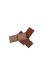 Milk organic chocolate pieces isolated over white background.