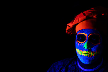 Man with neon makeup for a Neon Party For halloween