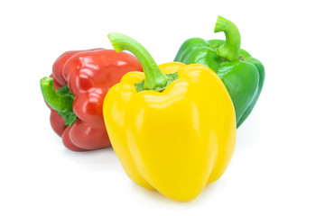 Yellow, Red, Green, bell pepper or sweet pepper or capsicum isolated on white background with clipping path..