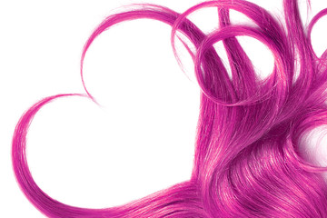 Pink hair in shape of heart, isolated on white background