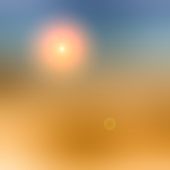 Abstract blurred gradient background with glowing orange spot. Blue, brown color.