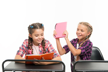 Books are not for hitting. Naughty little girl spoiling her classmate for fighting on books...