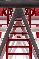 Pylon, red and white painted steel tower. The fragments showing the details of construction, joins,...