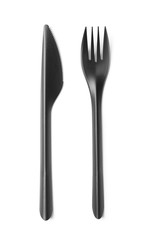 Black plastic knife and fork isolated