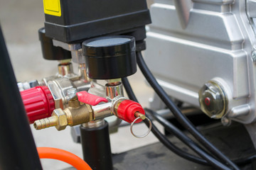 Part of a domestic reciprocating compressor close up.