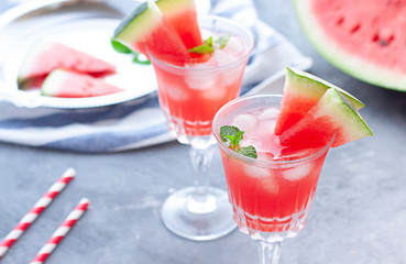 Watermelon cocktail with lemon and mint. Refreshing lemonade close up