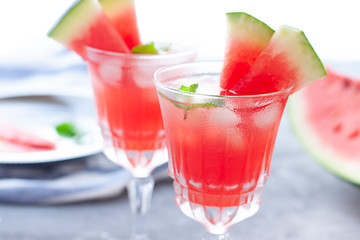 Watermelon cocktail with lemon and mint. Refreshing lemonade close up