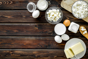 Breakfast on farm with dairy products on wooden background top view space for text