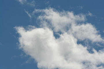cumulus clouds over blue sky