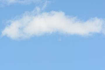 long cloud over blue sky