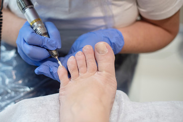 process of professional pedicures at salon. concept of beauty and health. 